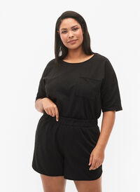 Enfärgade sweatshirtshorts med fickor, Black, Model