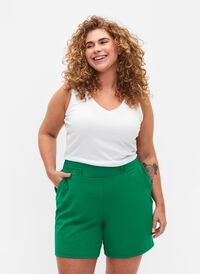 Shorts med fickor och lös passform, Jolly Green, Model