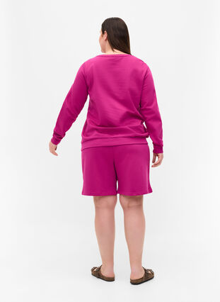 Shorts i sweatshirtmaterial med texttryck, Festival Fuchsia, Model image number 1