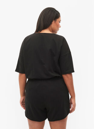 Enfärgade sweatshirtshorts med fickor, Black, Model image number 1