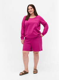 Shorts i sweatshirtmaterial med texttryck, Festival Fuchsia, Model