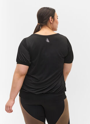Kortärmad träningströja, Black, Model image number 1