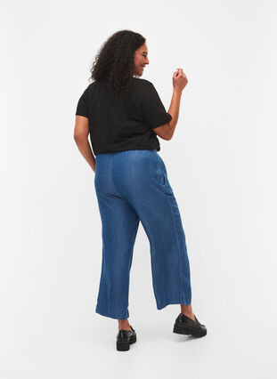 Löst sittande denimbyxor i lyocell (TENCEL™), Dark Blue, Model image number 1
