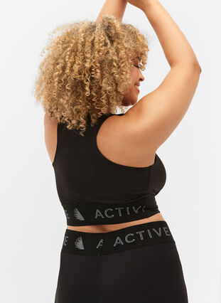 Sport-bh med kryssdetalj, Black, Model image number 1