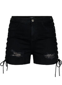 Denimshorts med slitna detaljer och snörning