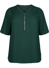 V-hals blus med dragkedja