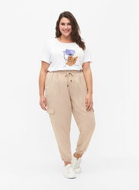 Löst sittande byxor i viskos med stora fickor, Oxford Tan, Model