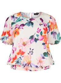 Blommig blus med smock