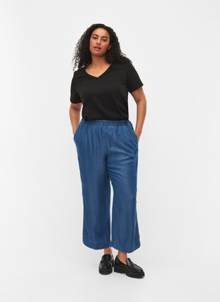 Löst sittande denimbyxor i lyocell (TENCEL™), Dark Blue, Model image number 0